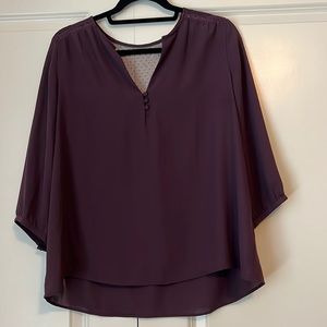 Plum colored polyester 3/4 sleeve blouse